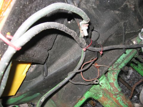 1979 Ford F-150 - Close-up of engine wiring and components, showing a yellow part and a SuperMotors logo.