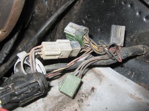 1979 Ford F-150 - A tangle of wires and connectors, likely part of a vehicle's electrical system.