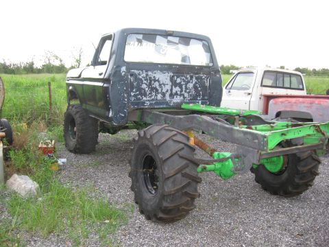 1979 Ford F-150 - This modified 1979 Ford F-150 chassis is equipped with oversized tires, suggesting off-road use or a custom build.