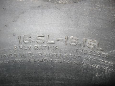 1979 Ford F-150 - This tire sidewall displays its size as 16.5L-16.15L with a 6 PLY RATING and "AGRICULTURAL IMPLEMENT SERVICE ONLY" warning.