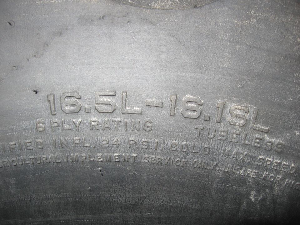 Tire sidewall shows 16.5L-16.15L size and 6 PLY RATING