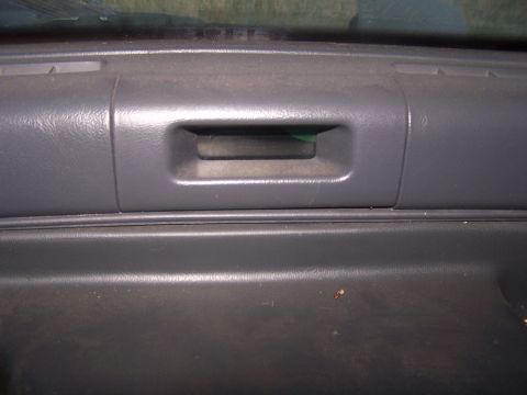1994 Ford Probe - Close-up of a gray dashboard vent, likely from an older vehicle's interior.