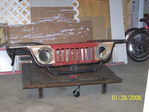 1988 Suzuki Samurai - headlight buckets welded in, skin patterns for around the headlights cut and the 410 grille close