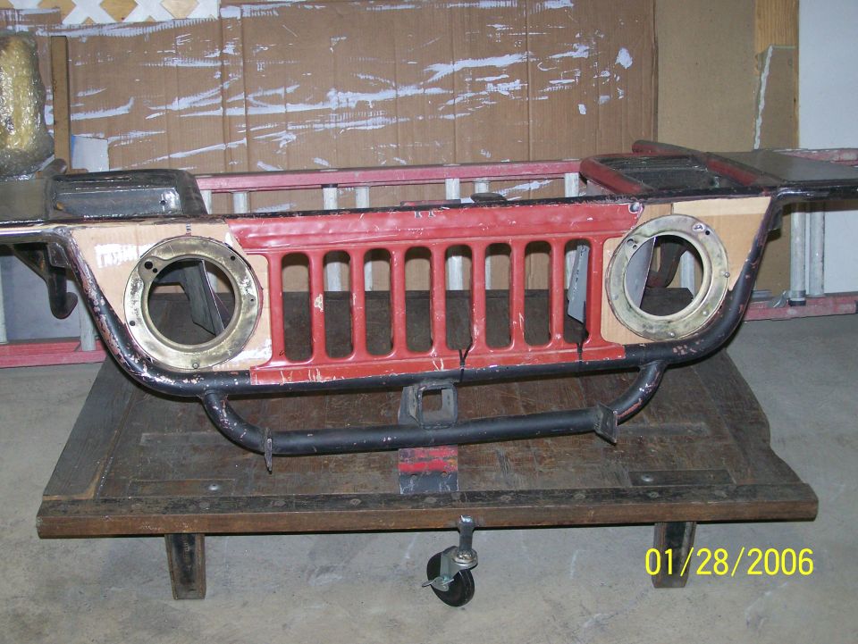 headlight buckets welded in, skin patterns for around the headlights cut and the 410 grille close 2