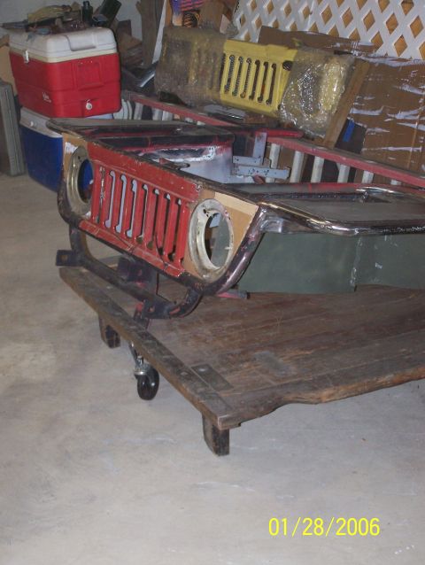 1988 Suzuki Samurai - more of a side shot of headlight buckets welded in, skin patterns for around the headlights cut and the 410 grille close