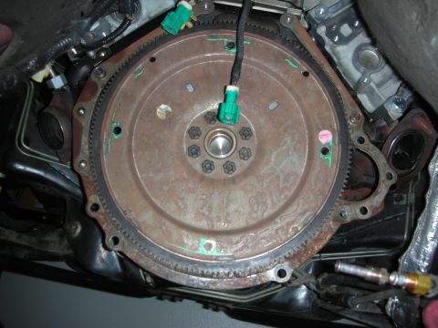 1992 Ford Crown Victoria - Flywheel and bell housing assembly, likely from a vehicle's transmission system.