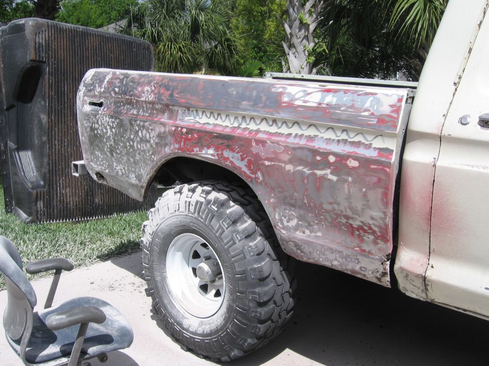 1979 Ford F-150 side view, rear fender in primer with bodywork