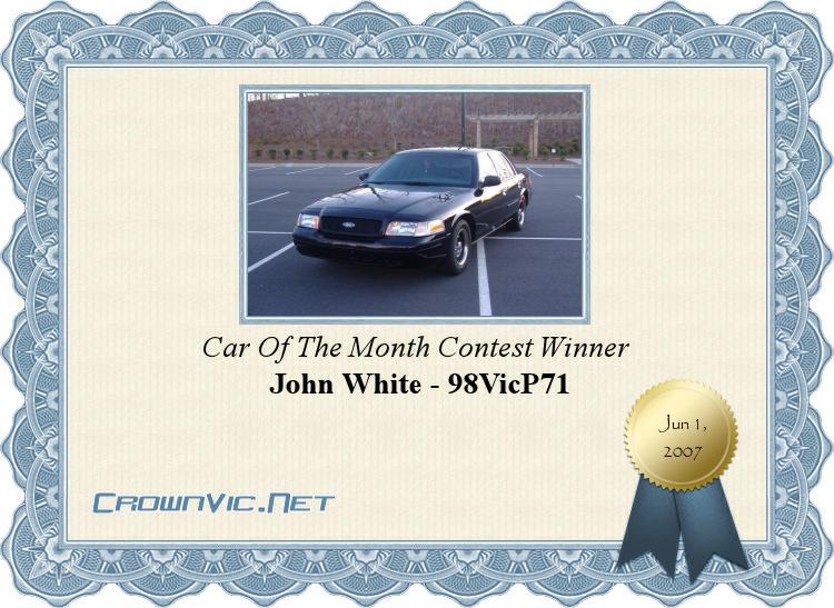 Black 2001 Ford Crown Victoria parked in a lot, shown on a certificate
