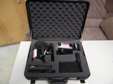 1991 Ford LTD Crown Victoria - A portable Decatur radar unit is organized within a black carrying case with custom foam inserts.