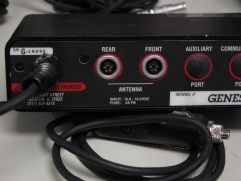 1991 Ford LTD Crown Victoria - Close-up photo of the Genesis I detector module rear panel: rear/front antenna ports, auxiliary and communications ports, power input 10.8-…