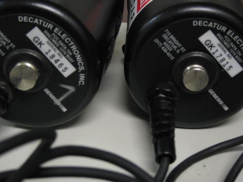 1991 Ford LTD Crown Victoria - Close-up view of two Decatur Electronics radar units, identified by serial numbers GK 18465 and GK 17815.