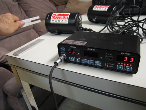 1991 Ford LTD Crown Victoria - A close-up of police radar equipment, including two Decatur radar units and a Genesis I control box.