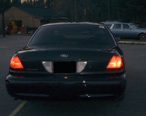 2000 Ford Crown Victoria - note: new 'www.crownvic.net' decal on the rear window.
