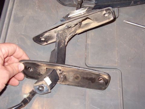 1983 Ford Bronco - Tuck the wiring harness under the arm and slide the gasket off.