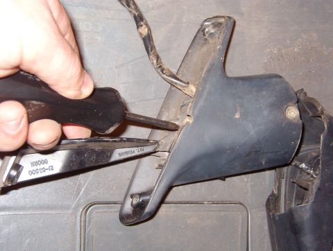 1983 Ford Bronco - Remove the 2 T-25 screws from the bottom of the mirror base. The outer screw is accessible while the mirror is installed on the truck, but…