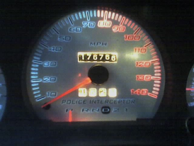 Police Interceptor gauge cluster showing 176766 miles