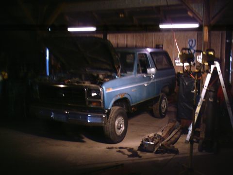 2001 Dodge 2500 - This blue Ford Bronco appears to be undergoing some work in a garage setting.