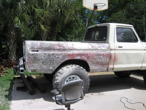 1979 Ford F-150 - This 1979 Ford F-150 pickup truck is shown during body work preparation, with the bed stripped down to bare metal.