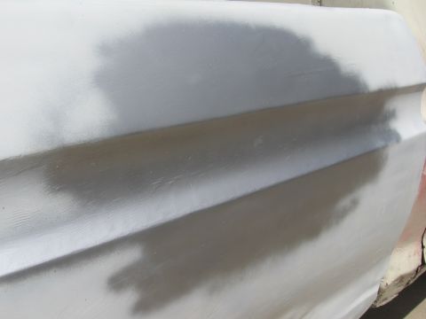 1979 Ford F-150 - Car door panel with primer applied, ready for paintwork.