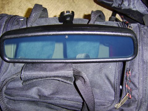 1996 Mercury Grand Marquis - A close-up view of an auto-dim mirror, not a vehicle.