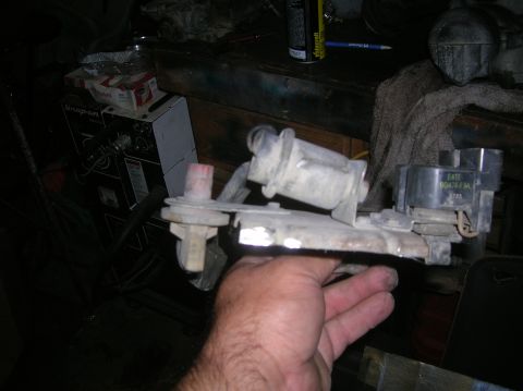 1985 Ford Bronco - Close-up of an automotive part with visible part numbers.