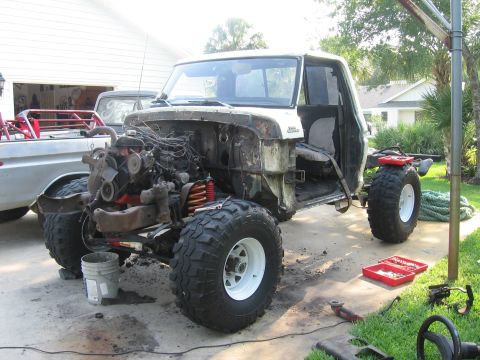 1979 Ford F-150 - This 1979 Ford F-150 is undergoing work, with its engine and chassis prominently displayed.