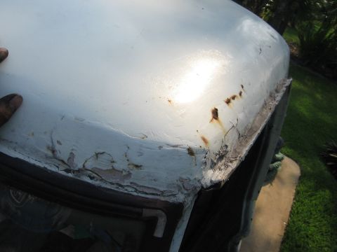 1979 Ford F-150 - Rust and peeling paint are visible along the edge of the truck's roof.