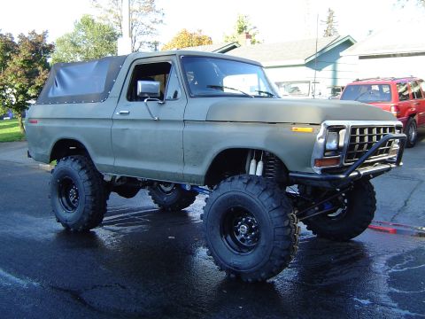 1978 Ford Bronco - This modified 1978 Ford Bronco features a lifted suspension and aggressive off-road tires, suggesting it's built for challenging terrain.
