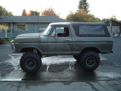1978 Ford Bronco - This 1978 Ford Bronco is equipped with a soft top and lifted suspension, ready for off-road adventures.