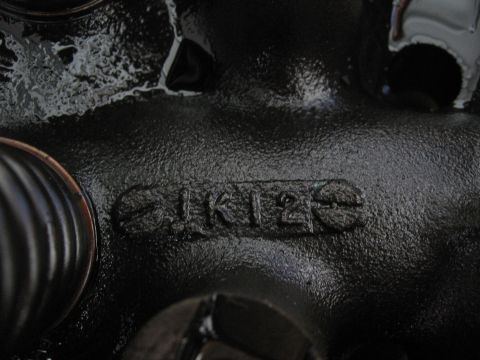 1979 Ford F-150 - Close-up of an engine part showing the casting number 1K125.