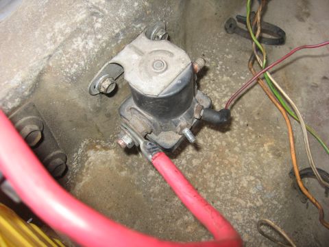 1979 Ford F-150 - Close-up view of a vehicle's starter solenoid and associated electrical wiring.