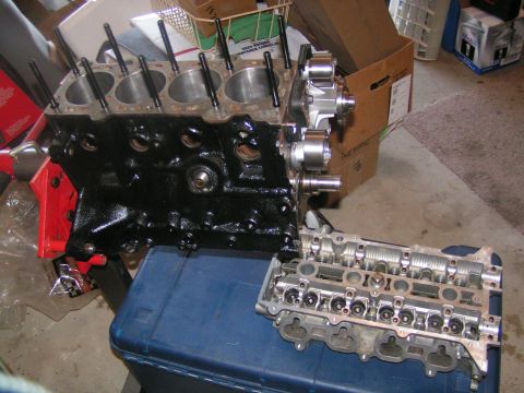 1996 Ford Probe - Engine block and cylinder head disassembled, likely for repair or rebuild.