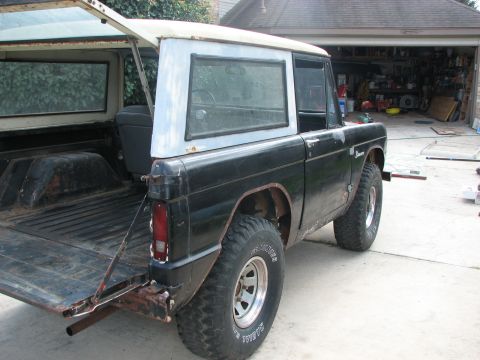 1966 Ford Bronco - This 1966 Ford Bronco is parked in front of an open garage.