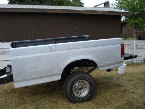 1994 Ford Bronco - This is the rear section of a Ford truck, possibly a F-series, undergoing preparation for a new paint job.