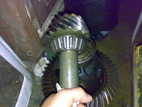 1995 Ford F-150 - Close-up of differential gears and a bearing, with part numbers visible on the shaft.