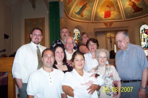 2000 Ford Crown Victoria - A family poses for a photo in a church, with a date stamp indicating it was taken on August 26, 2007.