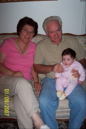 2000 Ford Crown Victoria - A family poses for a photo on a couch, with the date 01/09/2007 visible in the lower left corner.