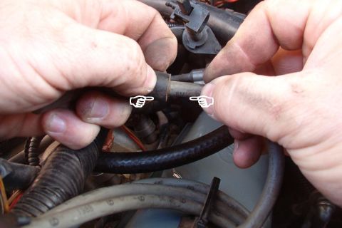 1983 Ford Bronco - Forcefully push the wire farther into the boot. It may be necessary to twist or pull it first if the boot is adhered to the wire, but try n…