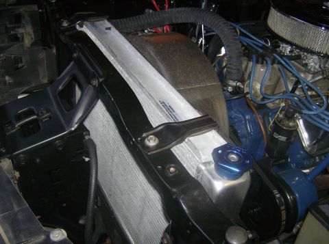 1970 Ford Ranchero - Close-up view of a vehicle's engine bay, focusing on the radiator and associated parts.