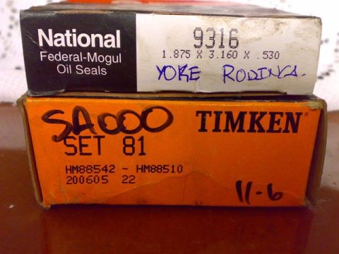 1995 Ford F-150 - Two boxes of automotive parts, one National Federal-Mogul Oil Seals and one Timken Set 81, are displayed.