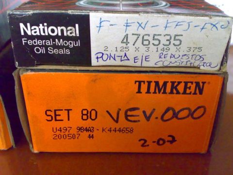 1995 Ford F-150 - Boxes of automotive parts are stacked, with visible branding and part numbers.
