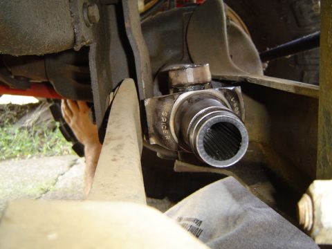 1989 Ford Bronco - This photo shows a close-up of a vehicle's driveshaft universal joint, with visible splines and a part number on the side labeled 'SPICER'.