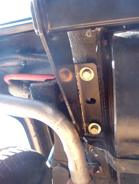 1975 Ford Bronco - The receiver is hung loosely and pulled as far rearward as possible (so it can't shift later) before the front & rear bolts are tightened.