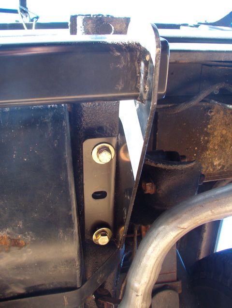 1975 Ford Bronco - The receiver is hung loosely and pulled as far rearward as possible (so it can't shift later) before the front & rear bolts are tightened.