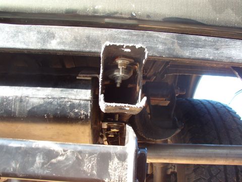 1975 Ford Bronco - Trailer hitch receiver mounting bracket attached to vehicle frame.