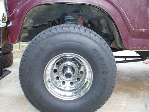 1980 Ford Bronco - Front axle moved 1.5" forward. Now have 4" between tire and rear inner fender. Also flexed it and no rubbing.