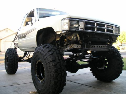 1986 Toyota Hilux - Modified 1986 Toyota Hilux pickup truck with extreme lift and oversized tires.