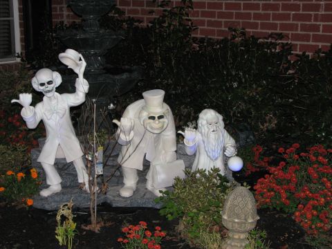 1991 Ford Bronco - Yard decorations ghost figures from a haunted mansion attraction.