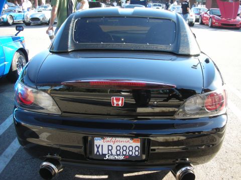 1998 Ford Crown Victoria - Straight-on rear view of a black Honda convertible with hardtop, Honda H badge, dual exhaust, and California plate XLR8888.