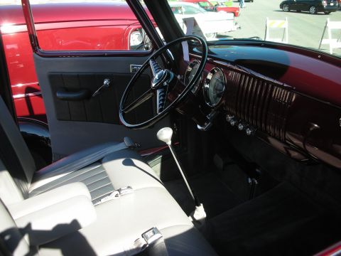 1998 Ford Crown Victoria - Interior view of a classic car, showing the dashboard, steering wheel, and seats.